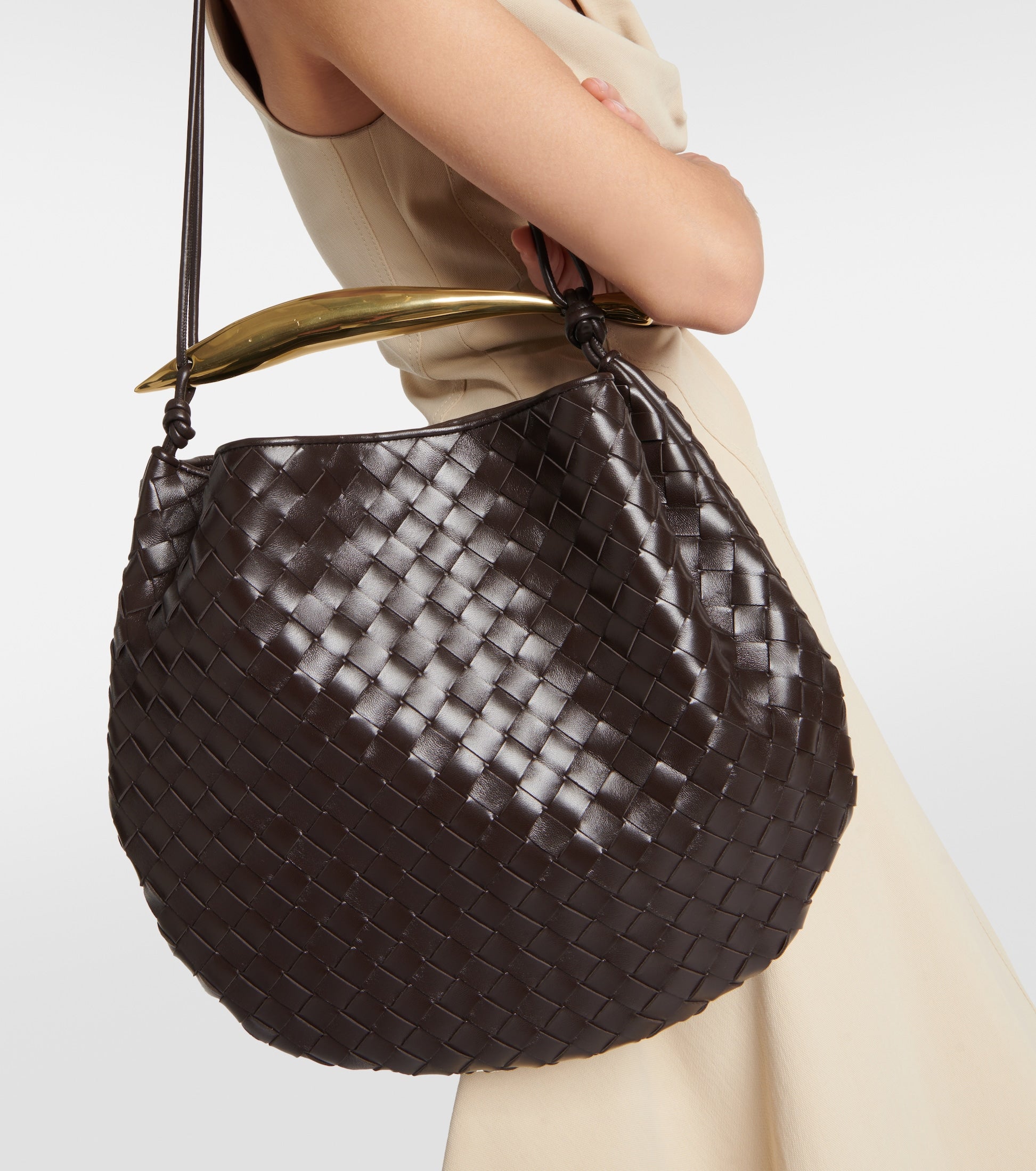 Medium leather bag with golden top
