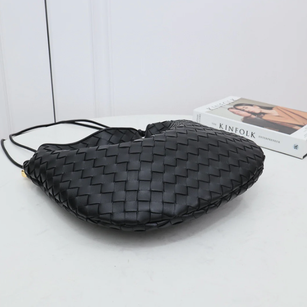 Medium leather bag with golden top
