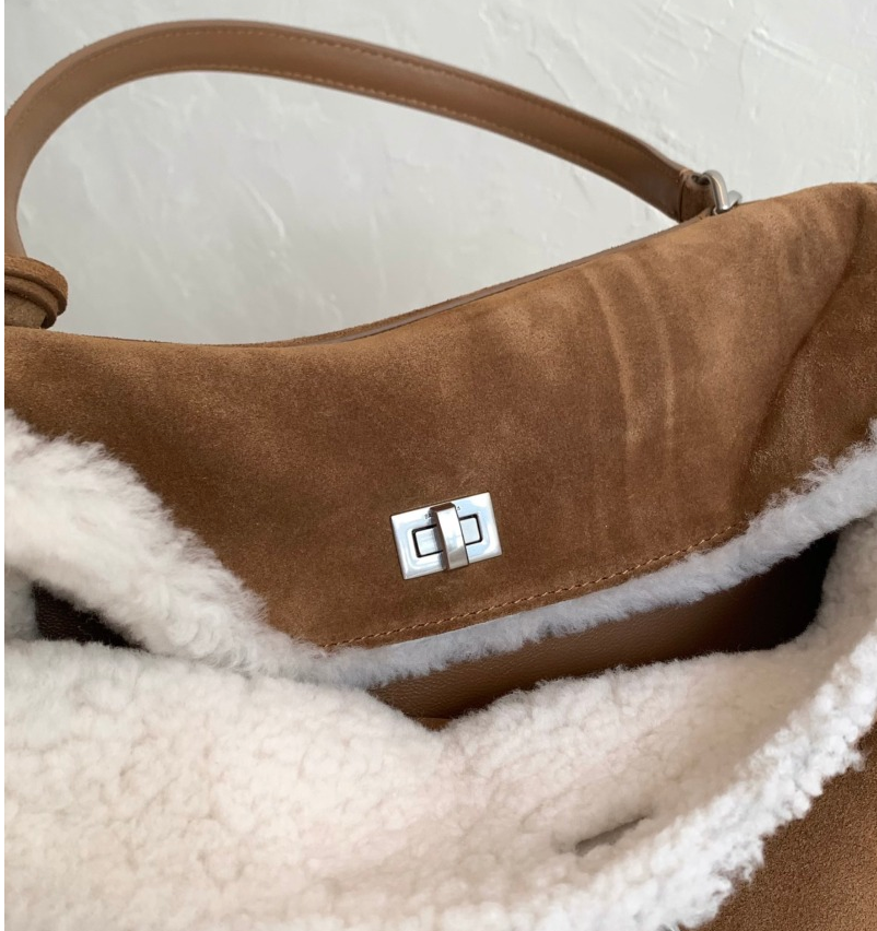 Rodeo suede top handle bag